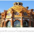 Barcelona, Monatskalender Januar. Detailreich verzierte Kuppel mit bunten Mosaiken und Fenstern.