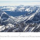 "Tiroler Alpen", darunter Kalenderzahlen. Schnee bedeckte Berge mit schroffen Gipfeln in klarer Fernsicht.