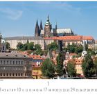 "Blick vom rechten Ufer der Moldau" zeigt historische Gebäude, darunter eine Kathedrale mit spitzen Türmen und rotem Dächern.