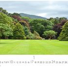 Kalender mit Zahlen 1 bis 31, "CASARES EDITION". Grüne Wiese, Bäume, Berge im Hintergrund.
