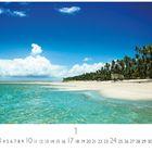 "Tropenparadies" steht unten. Kalendertage 1 bis 31 sind abgebildet. Zu sehen ist ein Strand mit Palmen und klarem Wasser.