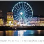 Text: "Altstadt", "CASARES EDITION", Kalender mit leuchtendem Riesenrad, Fluss und beleuchteten Gebäuden in der Nacht.