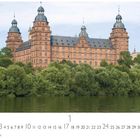 "Aschaffenburg, Schloss". Ein großes Schloss mit mehreren Türmen, umgeben von Bäumen, im Vordergrund Wasser.