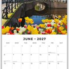 Kalenderseite für Juni 2027. Oben Tulpen und eine Brücke über einem Kanal in einer Stadt.