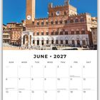 Kalender mit "June 2027". Historisches Gebäude mit Turm und Uhr unter blauem Himmel. Kalenderwochen und Notizzeilen unten.