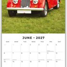 "June 2027" Kalender unter einem roten Oldtimer auf einer grünen Wiese.