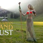 Text: "Stefan Soell", "BAVARIAN LAND LUST". Eine Frau in einem transparenten Rock in einer grünen Alpenlandschaft.