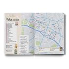 „Le Paris centre“, Liste ikonischer Boutiquen und Museen. Karte zeigt Arrondissements von Paris mit Hauptstraßen und Sehenswürdigkeiten.