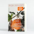 „Anja Jonuleit“, „Der Apfelsammler“. Illustration mit Apfel, Blättern und Frau. Logo mit Pinguin.