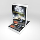 "SABINE WEISS: STÜRMISCHE KLIPPE, Sylt-Krimi, Spiegel Bestseller" auf einem Buchcover mit Strand und Dünen.