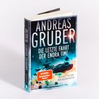 Buchcover mit Text: "Andreas Gruber, Die letzte Fahrt der Enora Time". Raumschiff und Weltraum im Hintergrund.