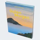 „Johanna Schaible. Guten Morgen. Hanser.“ Das Cover zeigt eine Landschaft mit einem pastellfarbenen Himmel.