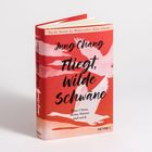 Roter Hintergrund mit schwarzem und weißem Text. Oben steht: "Die lang erwartete Fortsetzung des Weltbestsellers."