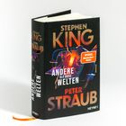 Buchcover von "Andere als diese Welten" von Stephen King und Peter Straub. Dunkles Design mit futuristischen Elementen.