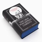 "Der Graf von Monte Christo" von Alexandre Dumas. Illustration: Schloss auf Felsen in monochrom auf Buchcover.