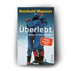 Zwei Bergsteiger umarmen sich in Schneelandschaft. Texteinblendung: "Reinhold Messner, Überlebt, Meine 14 Achttausender."