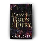 Der Text „A Dawn of Gods & Fury“ und „K.A. Tucker“ ist in goldener Schrift über einem dunklen, blumigen Hintergrund.