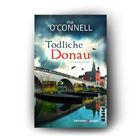 "Tödliche Donau: Kriminalroman" von Pia O'Connell. Darstellung eines Flusses und einer Brücke mit Gebäuden im Hintergrund.
