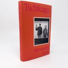 "Tschikago", "Roman", "Alexandra Stahl", "CLAASSEN" auf einem roten Buchcover mit Schwarz-Weiß-Foto von zwei Menschen.