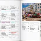 Inhalt mit Seitenzahlen für London-Bezirke und Sehenswürdigkeiten. Bild: Buntes Straßenszenario am Portobello Road Market.