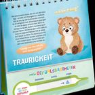 „Ich bin traurig“, „Traurigkeit“, „Überleg mal: Was hilft dir, wenn du traurig bist?“ und „Wie stark ist mein Gefühl?“ Ein trauriger Bär.