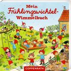 Text: "Mein Frühlingswichtel-Wimmelbuch". Illustration von Wichteln, die draußen spielen und arbeiten, umgeben von Natur.