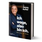 Dr. Georg Kofler, "Ich wage, also bin ich. Mein Leben. 101 Szenen." Ein Mann im blauen Anzug mit verschränkten Armen.