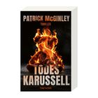 Text: "PATRICK McGINLEY, THRILLER, TÖDES KARUSSELL, blanvalet". Ein brennender Teddybär vor dunklem Hintergrund.