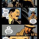 Hauptquartier von General Grimaldi. Zwei Männer diskutieren hitzig in einem Büro, beide in Anzug und Hut.