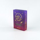 Box mit der Aufschrift: "Das Orakel der Wünsche". Lila und gelbe Gestaltung mit Sternen und Mondsymbolen.