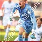 "Vorjahresabbildung" steht groß. Ein Torwart in blauer Ausrüstung ist fokussiert im Spiel. Unten ein Kalender für Januar vom 1. FC Nürnberg.