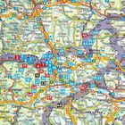 Straßennamen, Zahlen, Städte wie Graz, Maribor und Varazdin; bunte Routen auf einer detaillierten geografischen Karte.