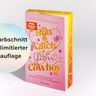 Text: „Mit Farbschnitt nur in limitierter Erstauflage“ und „How to Catch a Fake Cowboy“. Rosa Buch mit buntem Farbschnitt.