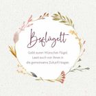 "Beflügelt. Gebt euren Wünschen Flügel, lasst euch von ihnen in die gemeinsame Zukunft tragen." Floraler Kranz.