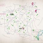 "Glückskarte" steht oben links. Eine Karte zeigt Städte und grüne Bäume, mit Flüssen und Ländern: Belgien, Frankreich, Deutschland. 