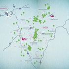 „Glückskarte“ oben links. Karte der Rhön mit Orten und Nummern. Symbole: Vogel, Fahrradfahrer, Kanu, Zug.