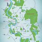 Text: "Glückskarte", "DÜSSELDORF", "RHEIN". 
Illustration: Karte von Düsseldorf, Flüsse und grüne Flächen hervorgehoben.