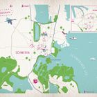 Schrift: "Glückskarte", "Schwerin", "Wismar", "Pfaffenteich", "Schlossinsel", "Schweriner See". Karte mit Gewässern und grünen Flächen.