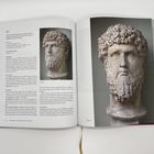 Text links oben: "29 COLOSSAL PORTRAIT OF CAESAR AURELIUS". Rechts eine antike Marmorbüste mit lockigem Haar und Bart.