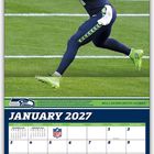 "JANUARY 2027", "Seattle Seahawks", "Martin Luther King Jr. Day", Spieler in blau-grüner Ausrüstung fängt Football.