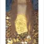 Kalenderseite mit den Zahlen 1 bis 31. Kunstwerk: Goldener Helm, Gesicht, darunter ein kunstvolles Muster und ein Gesicht.