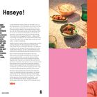 „Anyoung Haseyo!“ Ganzseitige koreanische Essensbeschreibung. Ein gedeckter Tisch, eine Person in roter Jacke draußen.