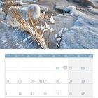 Kalender für Januar 2027. Winterliche Küstenlandschaft mit eisbedeckten Felsen und Dünen.