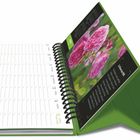 Text: "La France RHS." Spiral-Tischkalender mit rosa Blumenfoto. Links sind Kalendertage, rechts eine Beschreibung mit Blumen.