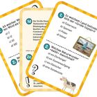 Text auf Karten: Fragen zu Naturwundern, mit Auswahlmöglichkeiten. Beispiel: Wo ist der "Große Geysir"? Optionen: Island etc.