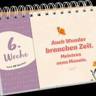 „6. Woche, noch 34 Wochen.“ „Auch Wunder brauchen Zeit. Meistens neun Monate.“ Illustration mit Blumen und Spiralbindung.