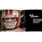 OLAF MANTHEY, born 1955. Helm mit "MANTHEY" und "AUSTIN ROVER". Gesicht im Auto, Texte über Nürburgring-Erfolg.