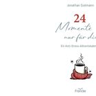 „24 Momente nur für dich“ in blauer und roter Schrift. Darunter eine Illustration: Eine dampfende Tasse in einem Schal.