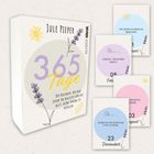 Buchcover: "365 Tage", begleitet täglich, erfüllt Träume. Karten: Motivierende Sprüche und Illustrationen mit floralen Akzenten.