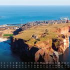 Kalender unten: Januar, Tage Fr-So, Hellgoland. Oberhalb: Insel mit Klippen und Gebäuden, umgeben von Meer.